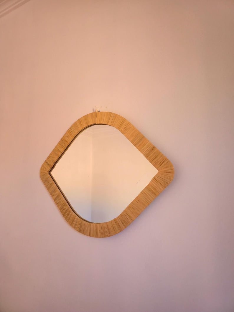 Moroccan raffia mirror in eye shape