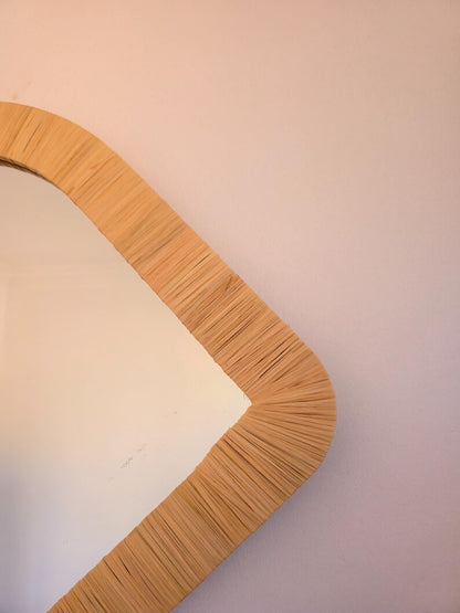 Moroccan raffia mirror in eye shape